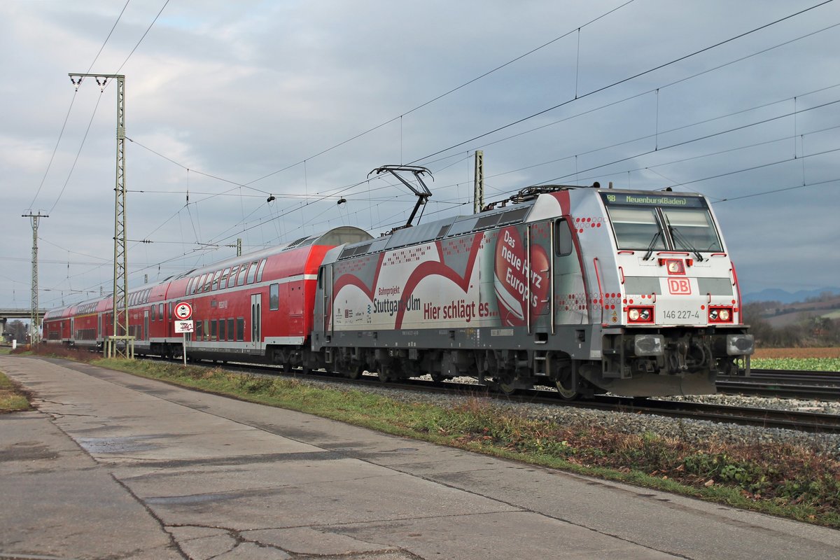 Einfahrt am 11.12.2016 von der neuen Freiburger 146 227-4  Bahnprojekt Stuttgart-Ulm  mit ihrer RB (Offenburg - Neuenburg (Baden)) über das Überholgleis in den Bahnhof von Müllheim (Baden).
