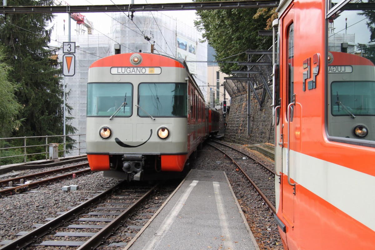 Einfahrt eines Zuges aus Ponte Tresa in den FLP Bahnhof in Lugano.10.09.13