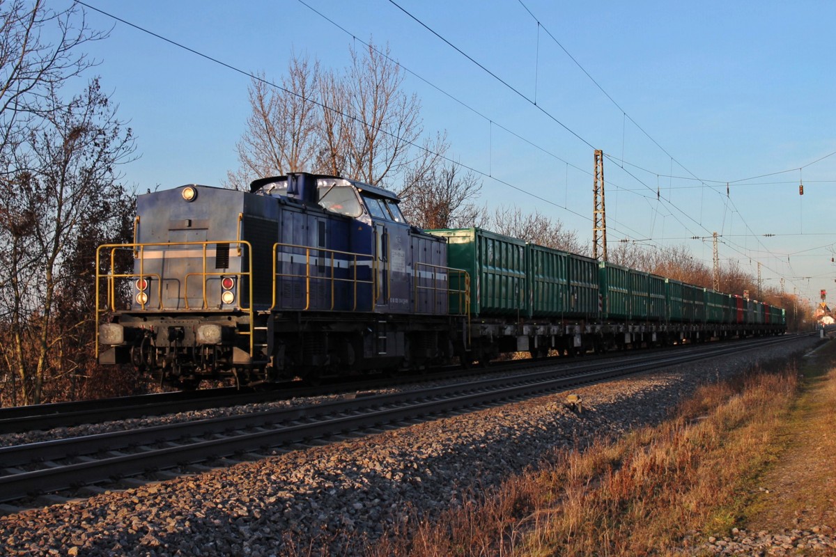 Einfahrt von Rhenus 102 (203 131-8) am 23.12.2013 in Heitersheim mit dem Müllzug aus Rastatt zur Müllverbrennungsanlage.