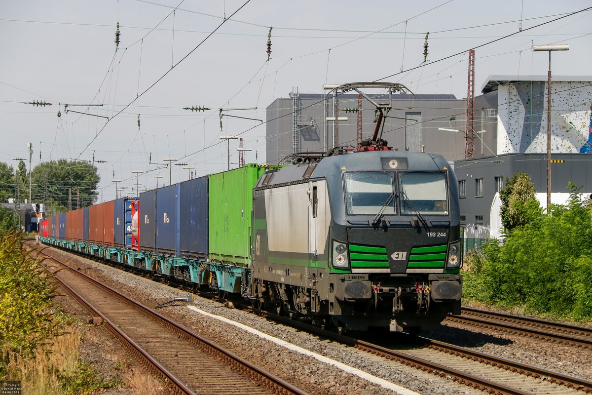 ELL 193 244 mit Containerzug in Hilden, August 2018.