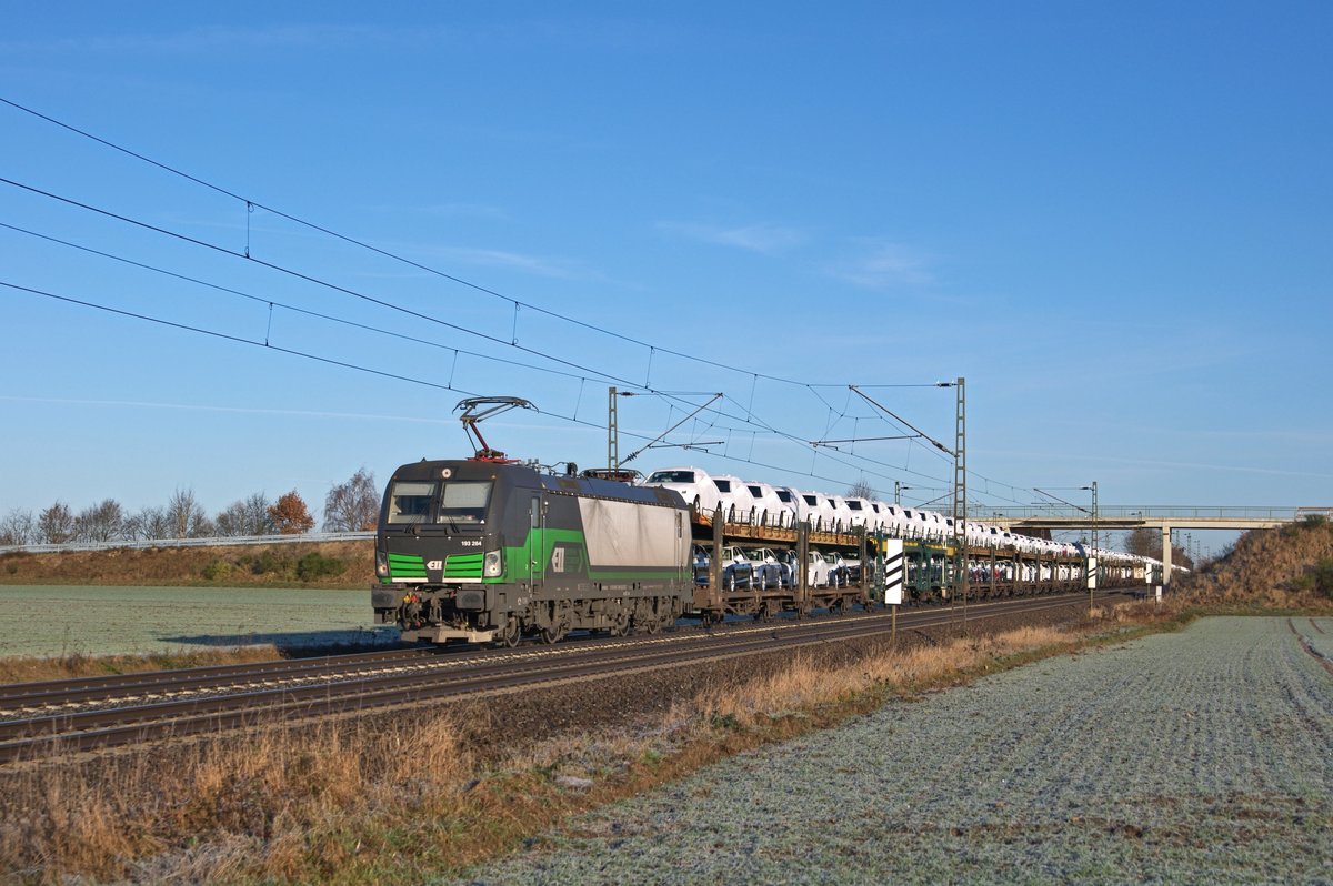 ELL 193 264, vermietet an Lokomotion, mit Autotransportzug am 28.11.16 durch Marl (Nds.) in Richtung Osnabrück. 