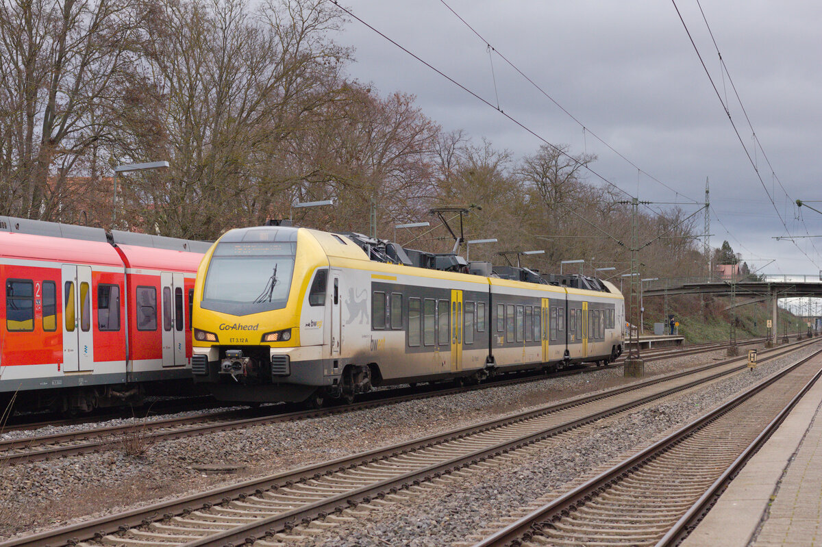 ET 3.12 A als MEX13 Aalen-Stuttgart am 30.12.2021 in Stuttgart-Sommerrain. 