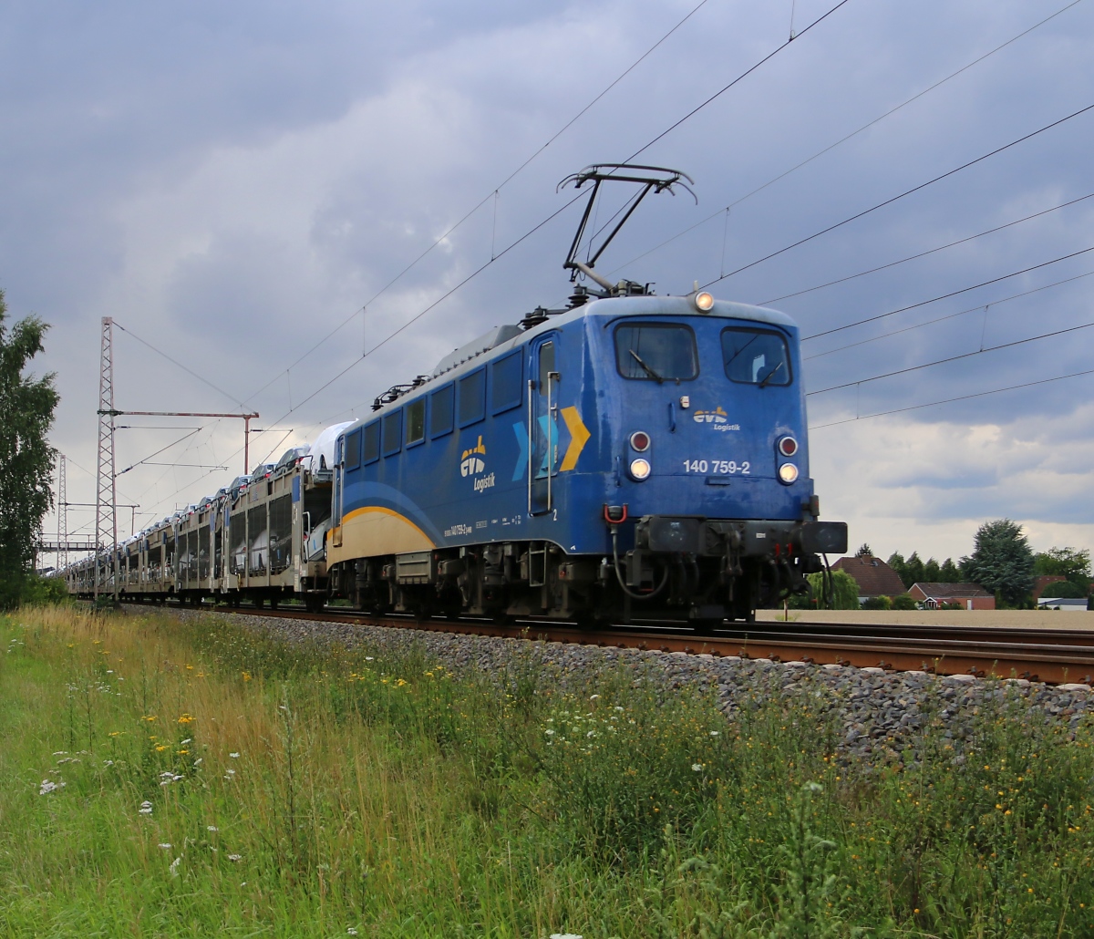EVB 140 759-2 mit Autotransportzug in Fahrtrichtung Seele. Aufgenommen am 29.07.2015 in Dedensen-Gümmer.