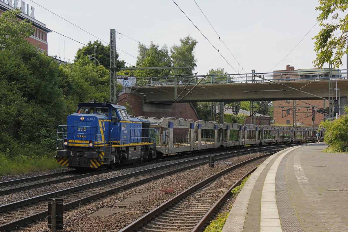 evb 2304 G1700 mit einem leeren Autozug am 20.07.2015 in Hamburg Harburg.