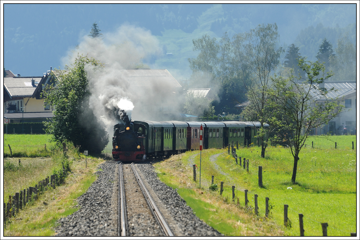 Ex. SKGLB 22 (Aquarius C) mit dem Sommernostalgiezug 3390 von Zell am See nach Krimml, aufgenommen am 20.6.2018 in Piesendorf.