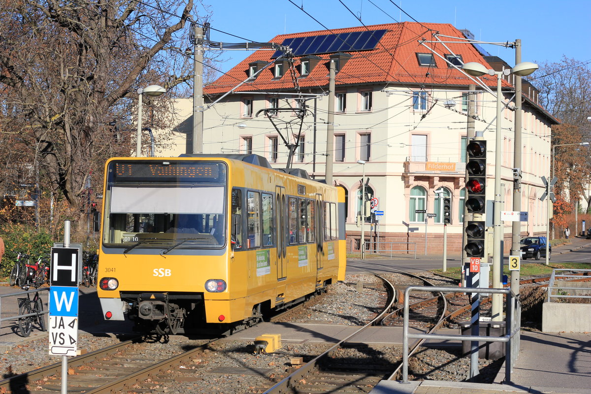 Fahrzueg 3041 (DT 8.4) als U1 aus Fellbach einfahrend in die Endhaltestelle Vaihingen Bahnhof am 29.11.2016.