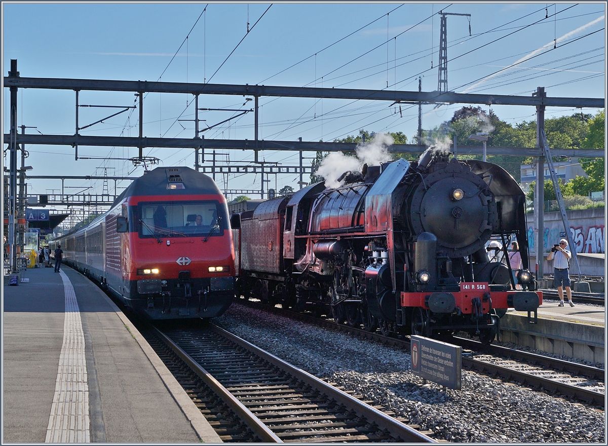 Fernverkehr gestern und heute: Links im Bild eine SBB Re 460 mit einem IR und recht im ild die SNCF  141 R 568 mit ihrem Extrazug nach Vallorbe. 

Morges, den 8. Juni 2019
