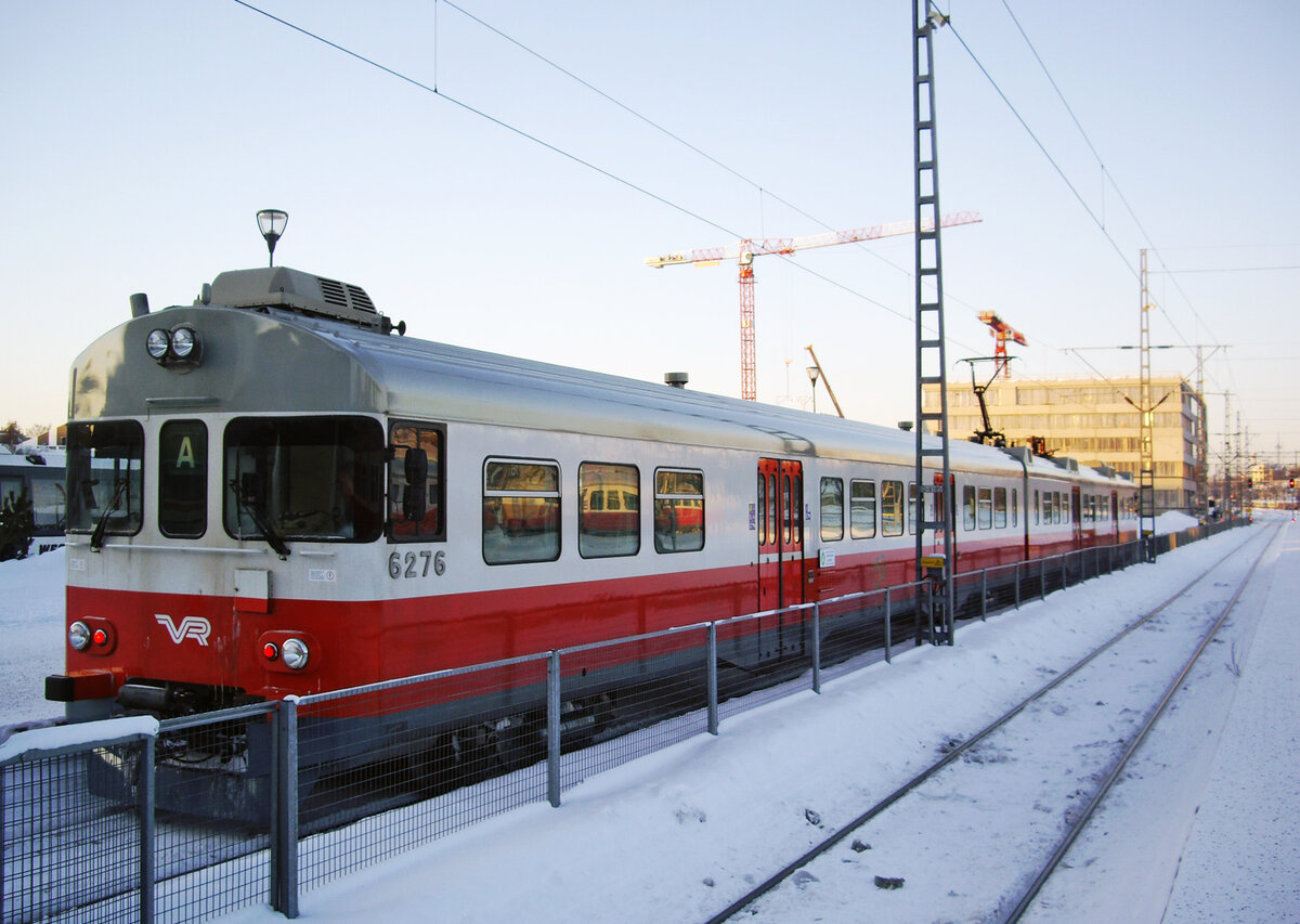 Finnish unit VR Sm2, Eioc driving trailer No. 6276, Helsinki Central Station, Line A waiting for departure to Leppävaara, 09 Feb 2012.