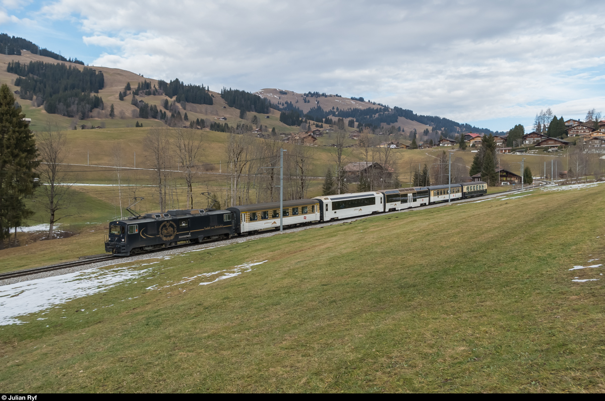 GDe 4/4 6002  Isabelle von Siebenthal  zieht am 24. Dezember bei Schönried einen Regionalzug in Richtung Gstaad - Montreux.<br>
Der Zug war leider nicht wie erhofft mit einem ABDe 8/8 bespannt.