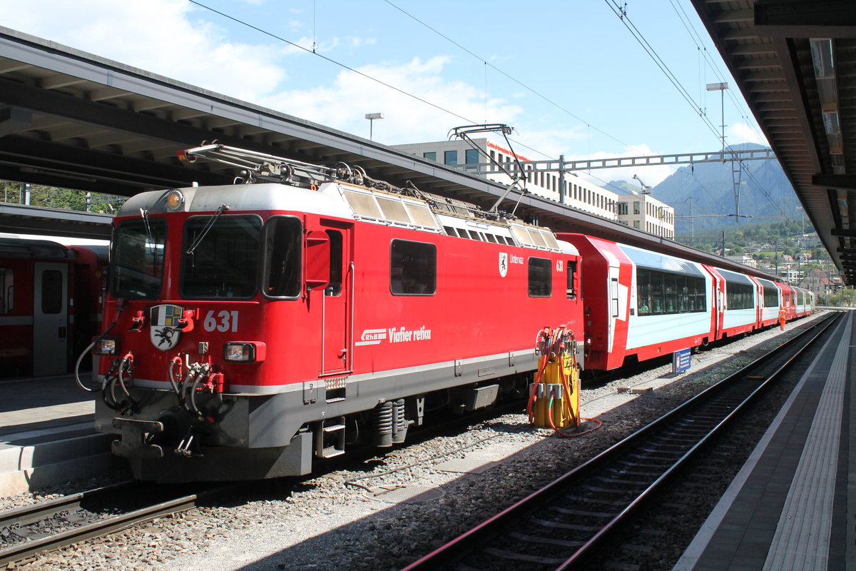 Ge 4/4'' 631 ''Untervaz'' am 6.7.2020 in Chur mit dem Glacier Express PE 903.