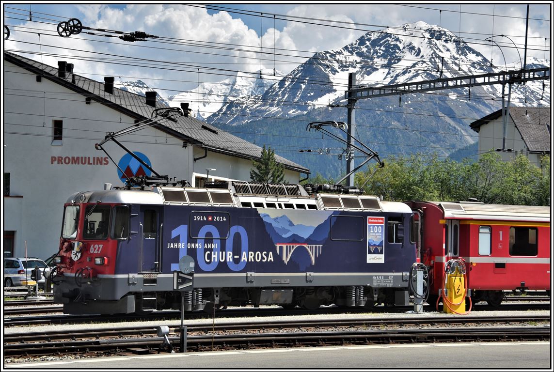 Ge 4/4 II 627  Reichenau-Tamins  vor der Engadiner Bergkulisse in Samedan. (19.06.2019)
