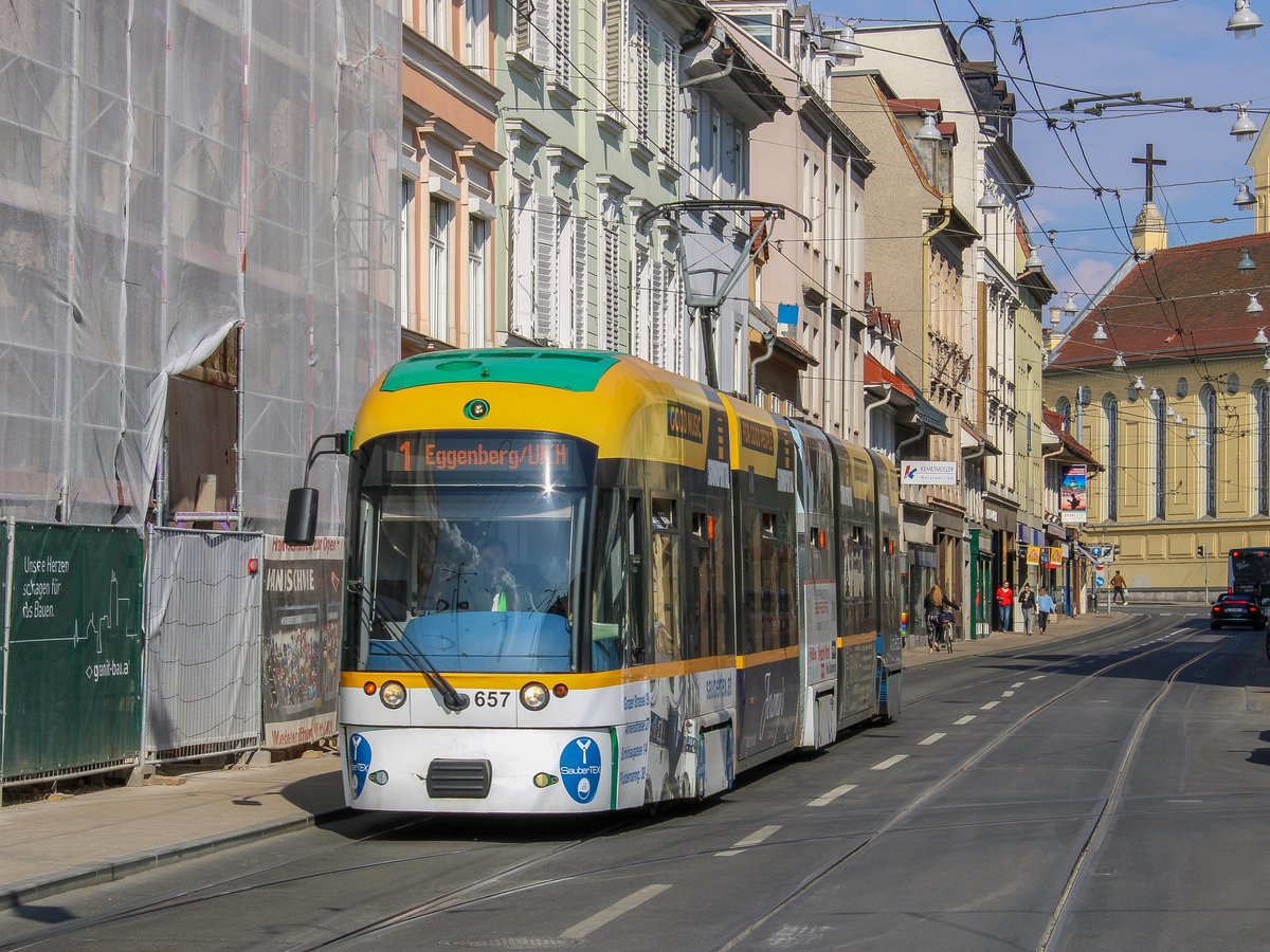 Graz. Cityrunner 657 der Graz Linien trifft hier am 27.03.2021 als Linie 1 Richtung Eggenberg/UKH am Jakominiplatz ein.