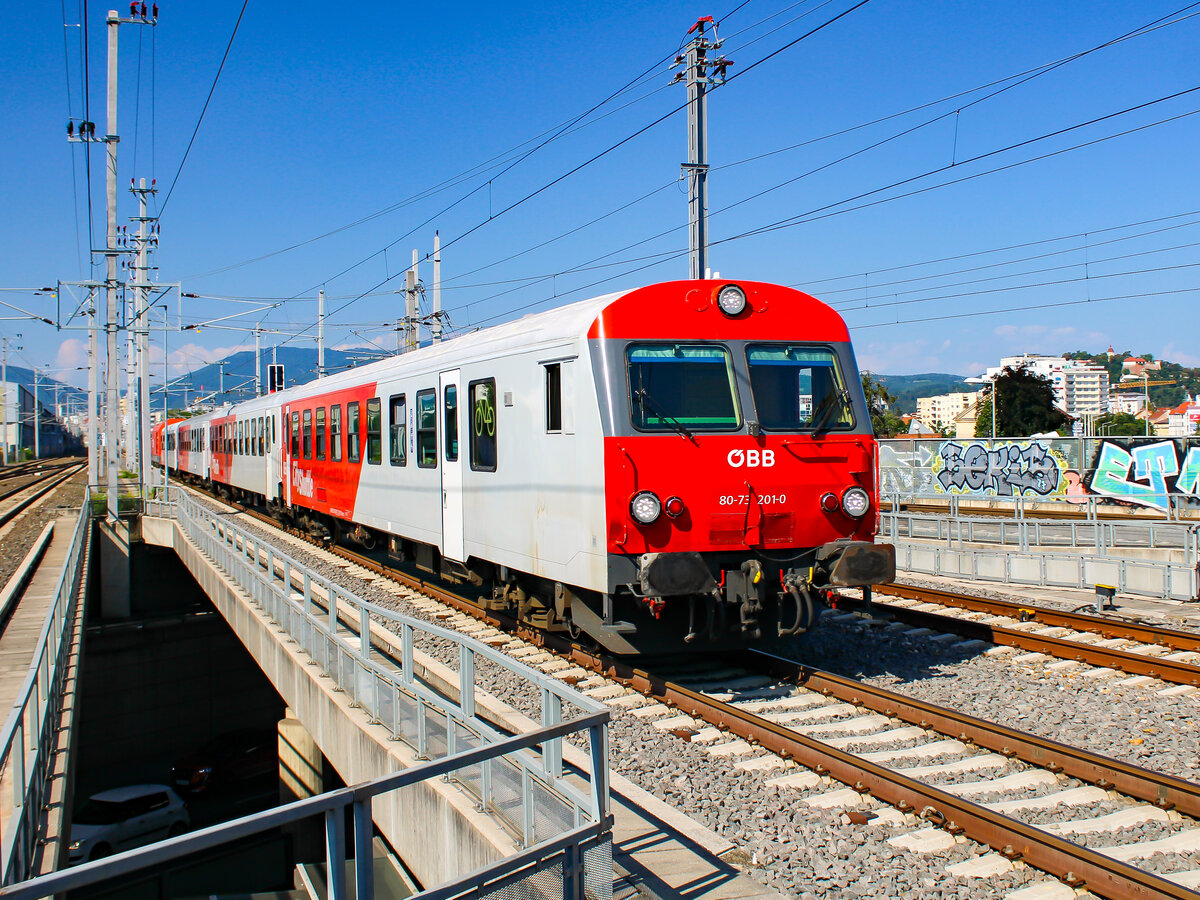 Graz. Der 8073 201 ist hier am 22.08.2023 als Regionalexpress in Graz-Don Bosco zu sehen.