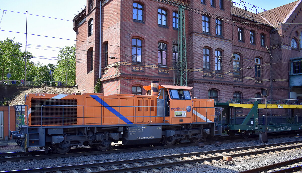 HBB - Hansebahn Bremen GmbH, Bremen [D] mit der northrail MaK G 1206 Lok  118  (NVR-Nummer:  92 80 1275 869-6 D-NRAIL ) und einem Ganzzug PKW-Transportwagen (leer) am 13.06.23 Vorbeifahrt Bahnhof Hamburg Harburg.