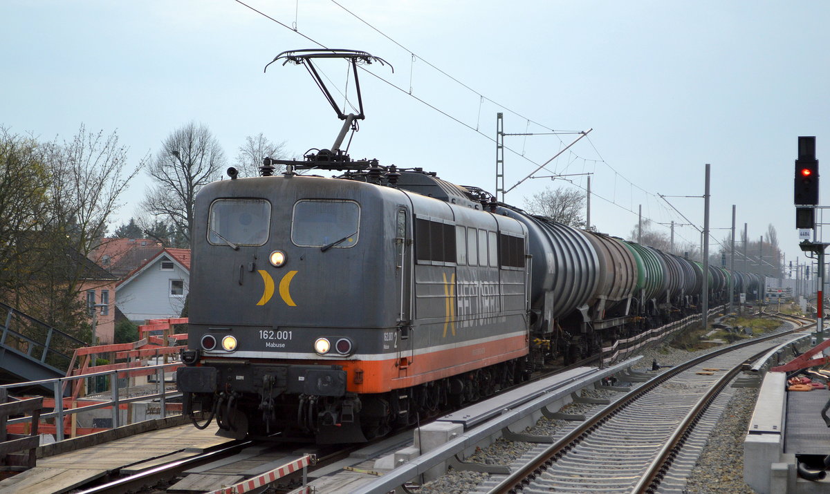 Hectorrail mit 162.001  Mabuse  (91 80 6151 013-0 D-HCTOR) und Kesselwagenzug (leer) Richtung Stendell am 04.12.20 Berlin Karow.