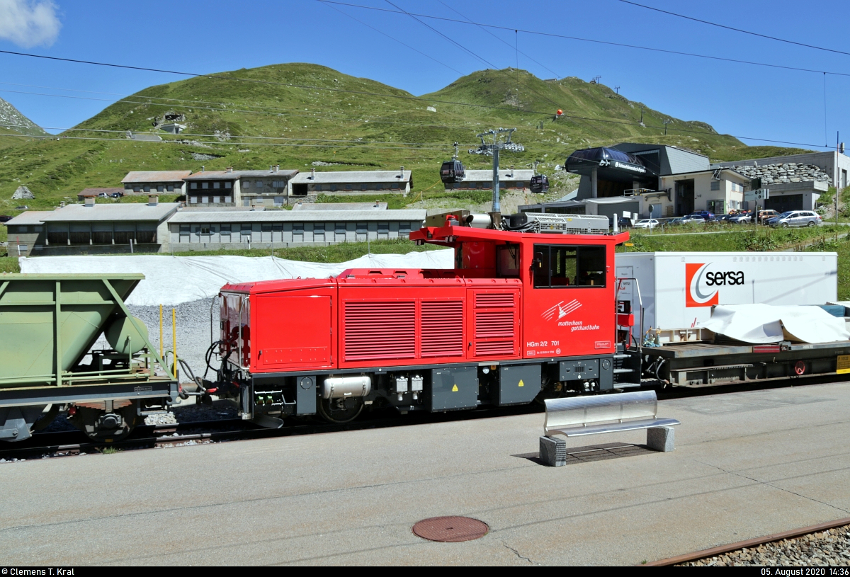 HGm 2/2 701 ist im Bahnhof Oberalppass (CH) zwischen Güterwagen abgestellt.
Aufgenommen aus einem Zugfenster.

🧰 Matterhorn-Gotthard-Bahn (MGB)
🚩 Bahnstrecke Brig–Disentis/Mustér (Furka-Oberalp-Bahn (FO) | 144)
🕓 5.8.2020 | 14:36 Uhr