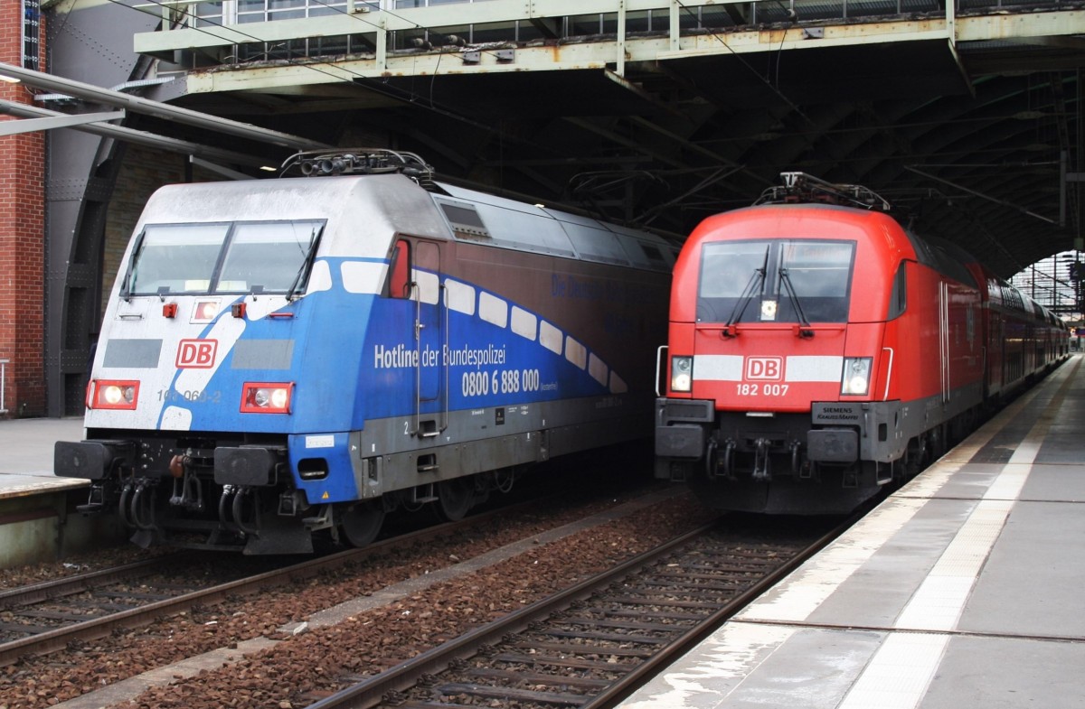 Hier links 101 060-2 mit IC2431 von Emden Außenhafen nach Berlin Ostbahnhof und rechts 182 007 mit einem RE1 (RE18127) von Magdeburg Hbf. nach Frankfurt(Oder), diese beiden Züge begegneten sich am 28.6.2014 in Berlin Hbf. 