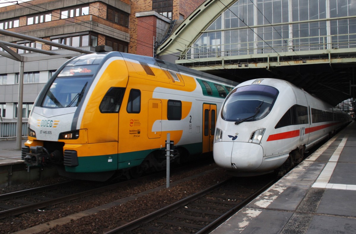 Hier links 445 105-0 als RE2 (RE83970) von Wismar nach Cottbus und rechts 605 011-6 als ICE381 von Århus H nach Berlin Ostbahnhof mit 605 016-5 als ICE38 von Østerport st nach Berlin Ostbahnhof, diese beiden Züge begegneten sich am 15.3.2014 in Berlin Ostbahnhof