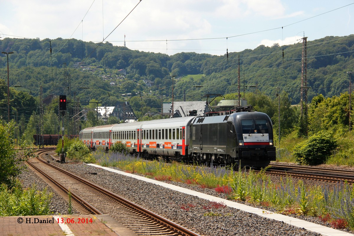 HKX1803 mit 182 534/ES 64 U2-034 am 13.06.2014 in Wuppertal Steinbeck. Der Zug wurde wegen Unwetterschäden über Wuppertal-Hagen umgeleitet.