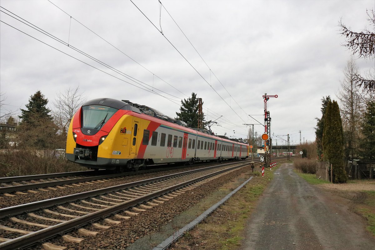 HLB Alstom Coradia Continental ET158 am 27.01.19 in Hanau Hbf Südeinfahrt 