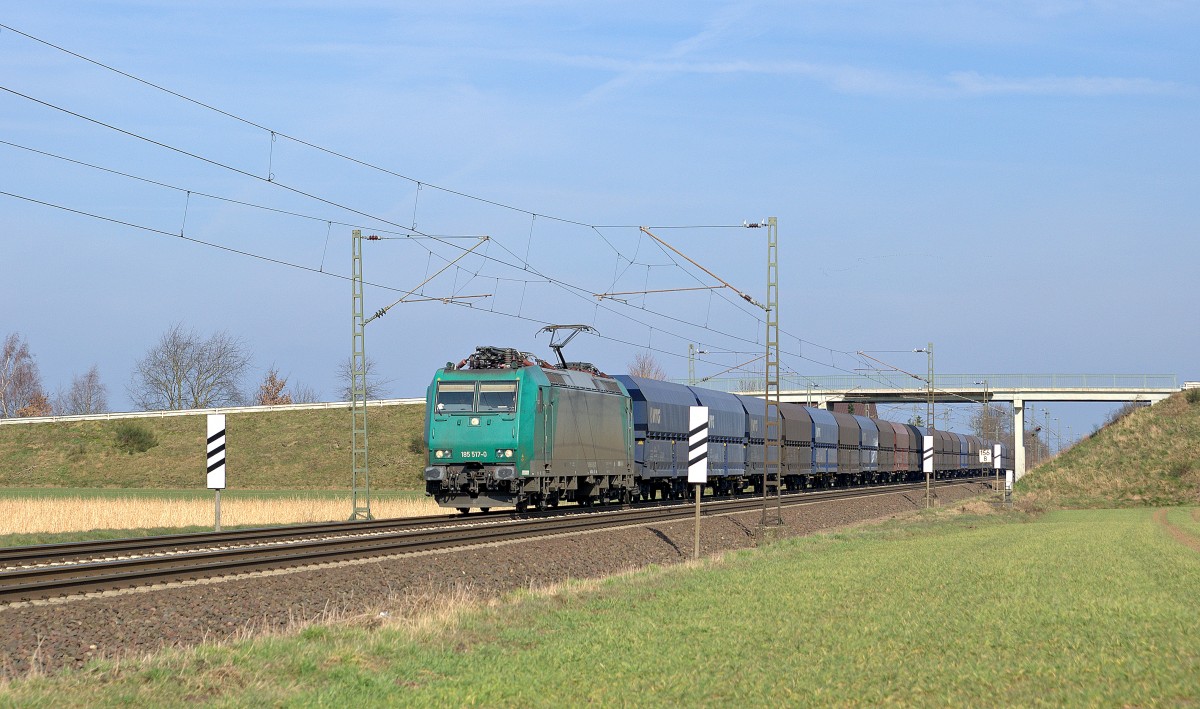 HML 185 517, vermietet an Captrain Deutschland, mit leerem Schttgutwagenzug Bremen Stahlwerke - Bottrop Sd (Marl, NI, 09.03.16).