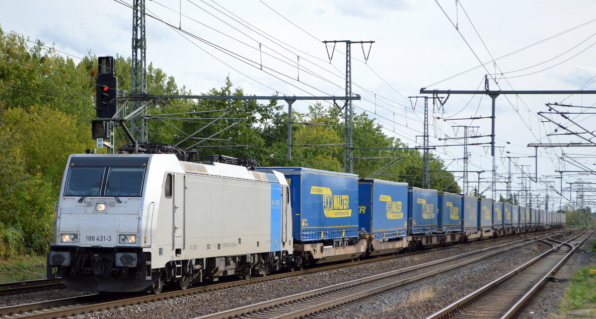 HSL Logistik GmbH, Hamburg [D] mit  186 431-3  [NVR-Nummer: 91 80 6186 431-3 D-Rpool] und Taschenwagenzug am 24.09.20 Durchfahrt Bf. Golm (Potsdam).