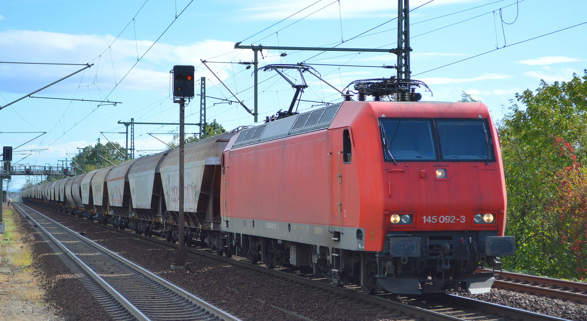 HSL Logistik GmbH, Hamburg [D]mit der BRLL Leasinglok  145 092-3  [NVR-Nummer: 91 80 6145 092-3 D-BRLL] und einem Getreidezug Richtung Dresden Hbf. am 01.10.19 Dresden-Strehlen. 