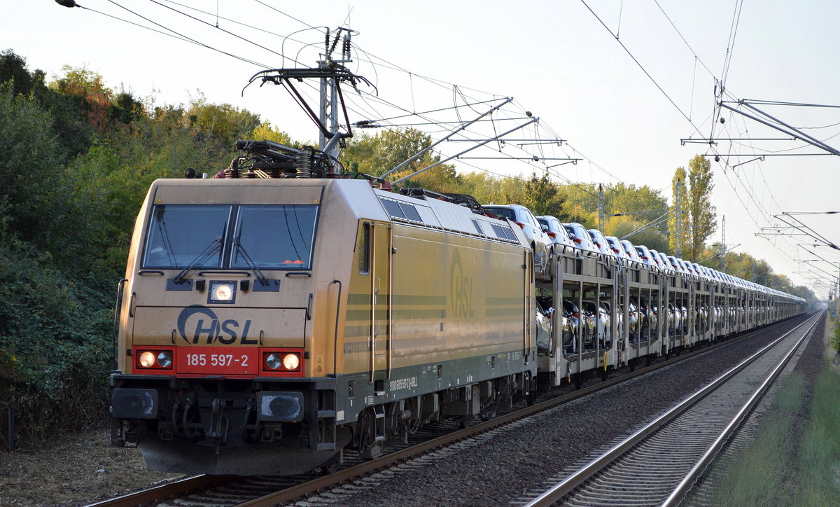 HSL Logistik GmbH mit  185 597-2  [NVR-Number: 91 80 6185 597-2 D-BRLL] und PKW-Transportzug (fabrikneue Toyota Modelle) Richtung Polen am 19.09.18 Bf. Berlin-Hohenschönhausen.