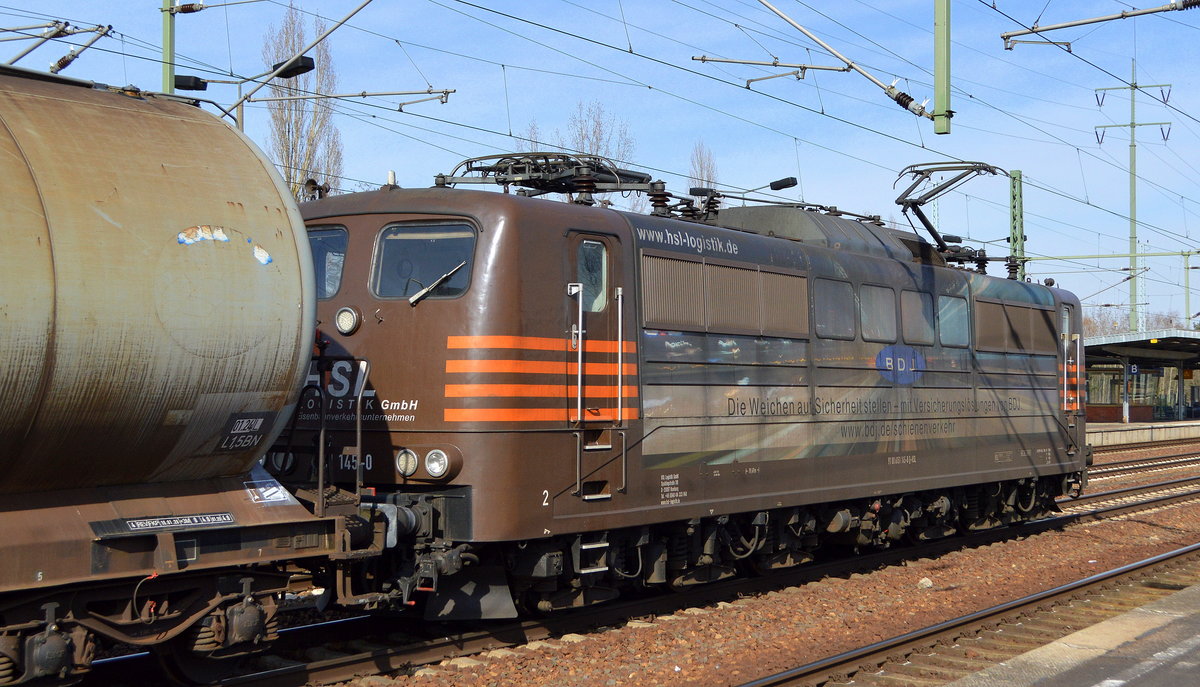 HSL mit  151 145-0  (NVR:  91 80 6151 145-0 D-HSL ) und Kesselwagenzug Richtung Stendell am 10.03.21 Durchfahrt Bf. Flughafen BER Terminal 5.