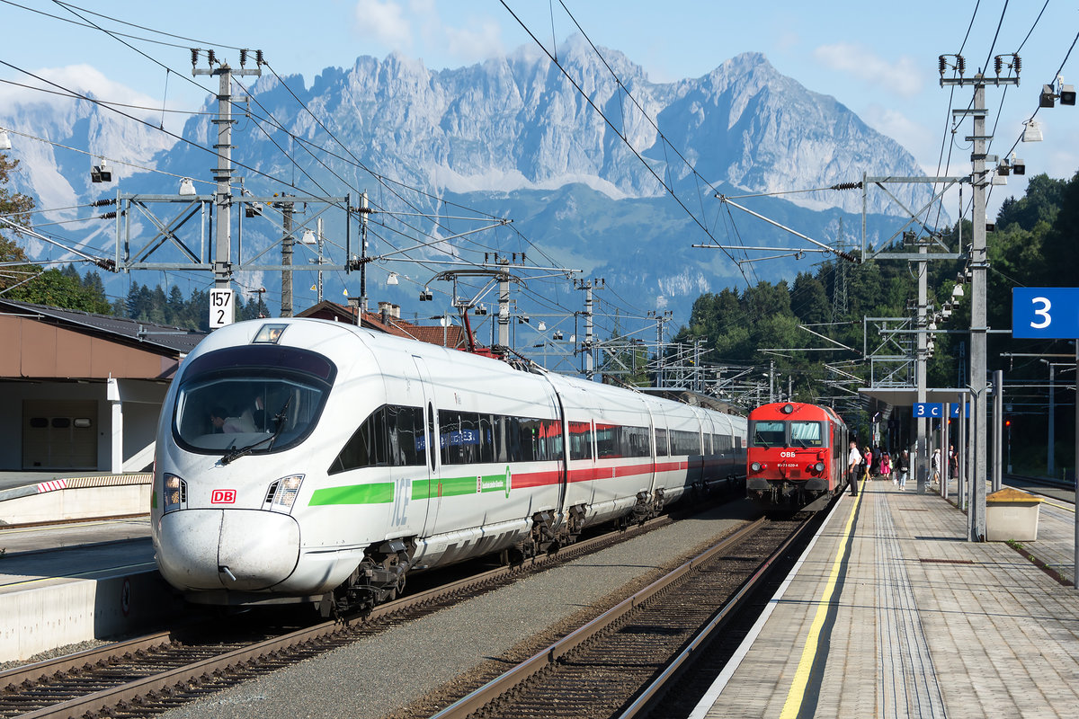 ICE 1280  Großglockner  und IC 515 treffen sich im Bahnhof Kitzbühel vor der Kulisse des Wilden Kaisers. Das Foto entstand am 22.08.2020.