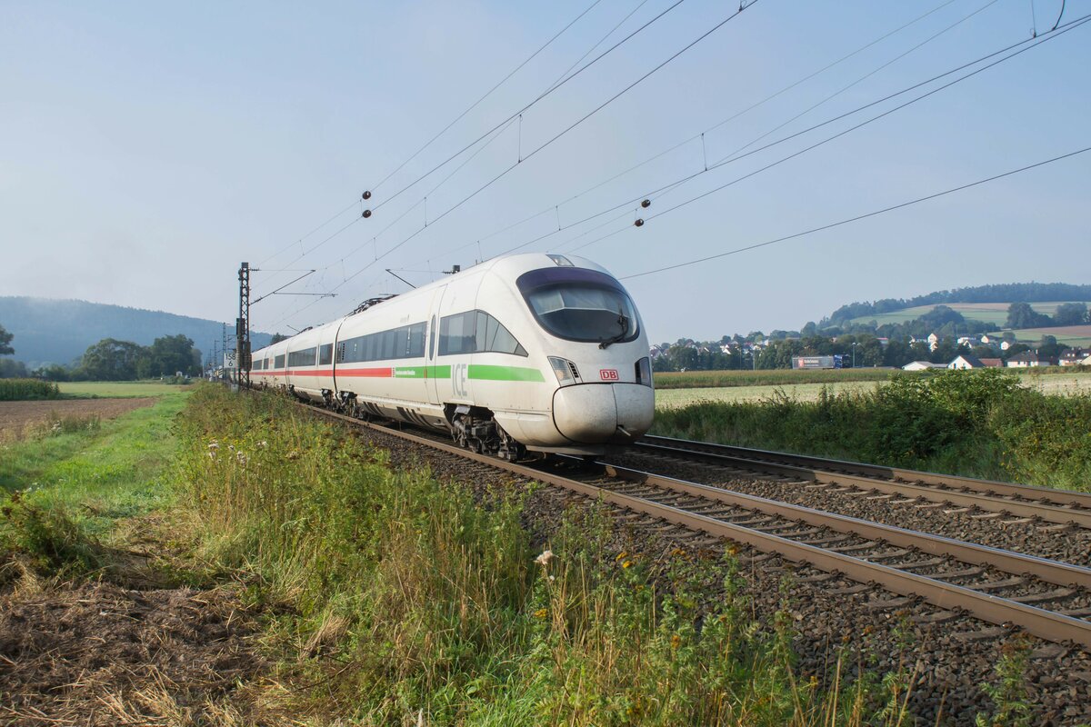 ICE 411 028-4  Reutlingen  ist am 23.08.2023 in Richtung Eisenach unterwegs, gesehen bei Reilos.