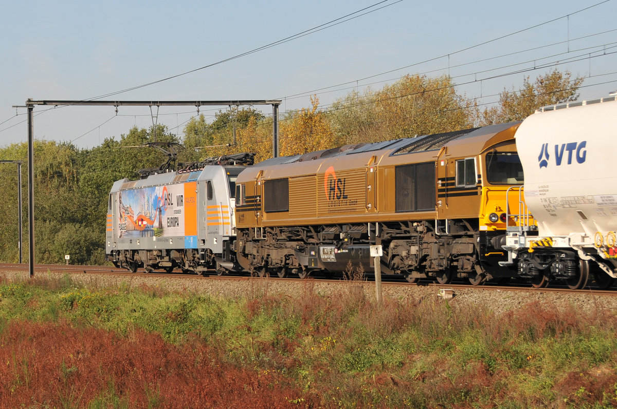 Im neuen HSL-Gewand präsentiert sich 266 117-1, die kalt im von der 186 181-4 gezogenen Güterzug Richtung Antwerpen mitlief. Aufgenommen am 18/10/2017 in Lummen. Erfreulich, dass durch solche Züge etwas mehr Farbe auf das belgische Schienennetz kommt.