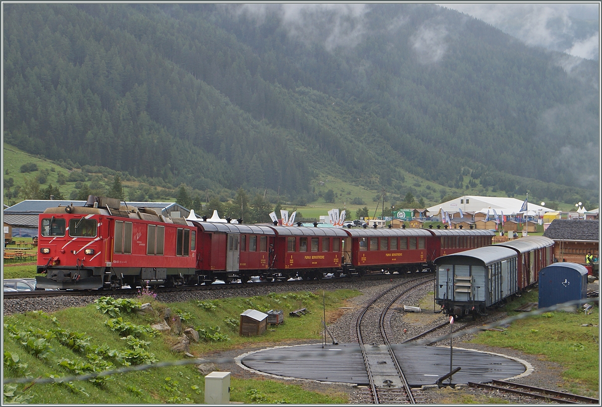 Im Rahmen der Feierlichkeiten  100 Jahre Brig - Gletsch (1914-2014)  wurde auf der Dampfbahn Furka Bergstrecke ein verstärkter Betrieb geboten und zum Einsatz neben den Dampfloks kam auch die DFB HGm 4/4 61, die hier mit einem Reisezug Oberwald in Richtung Gletsch verlässt. 

16. August 2014