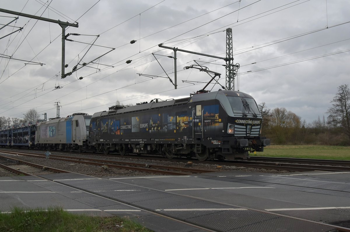 In Groß-Gerau kommt mir am heutigen Nachmittag die 193 875-2 und die stromlose 185 680-6 mit einem DACIA Autozug im Rücken vor meine Linse gefahren. 19.3.2017