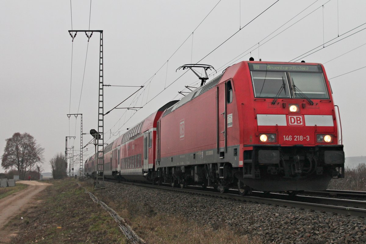 In Kürze erreicht die Freiburger 146 218-3 ihren vorletzten Zwischenhalt in Müllheim (Baden), als sie am 20.12.2016 eine RB (Offenburg - Neuenburg (Baden)) bespannte.