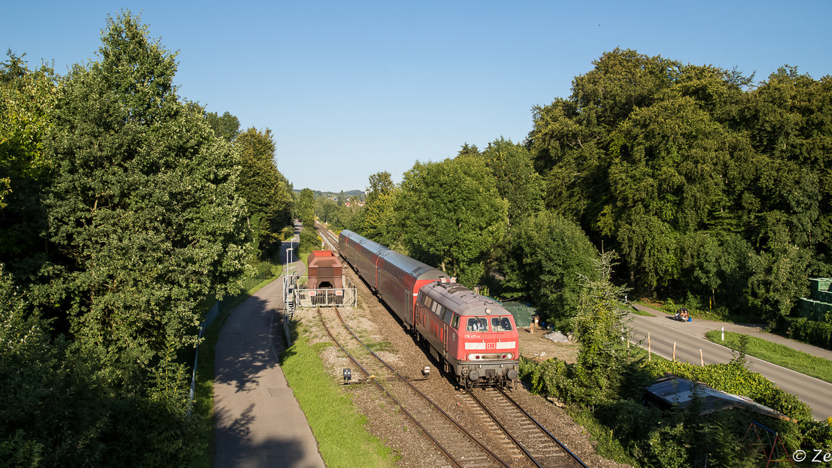 IRE 4214 am 25.08.2015 gezogen von 218 417-4 an der Awanst. Marschall bei Kressbronn. Das Marschall tatsächlich eine Ausweichanschlussstelle ist, kann man hier gut erkennen.