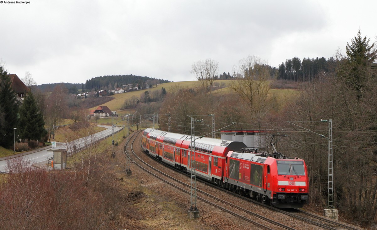 IRE 5312 (Konstanz-Karlsruhe Hbf) mit Schublok 146 236-5  Triber/Schwarzwaldbahn Erlebnispfad  bei St.Georgen 21.2.14