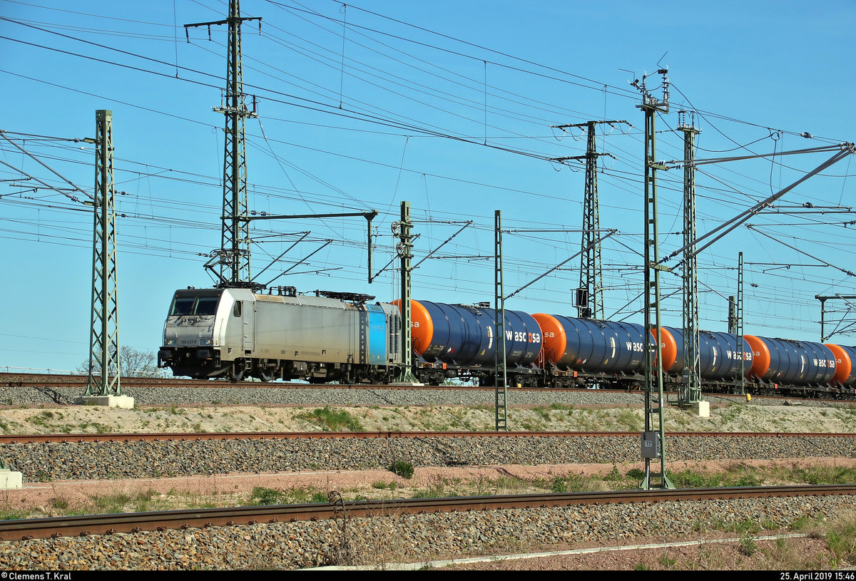 Kesselzug mit 186 433-9 Railpool, vermietet an die HSL Logistik GmbH (HSL), fährt in Halle (Saale), Karl-von-Thielen-Straße (Gebiet der DR), auf der Ostumfahrung für den Güterverkehr in nördlicher Richtung.
[25.4.2019 | 15:46 Uhr]