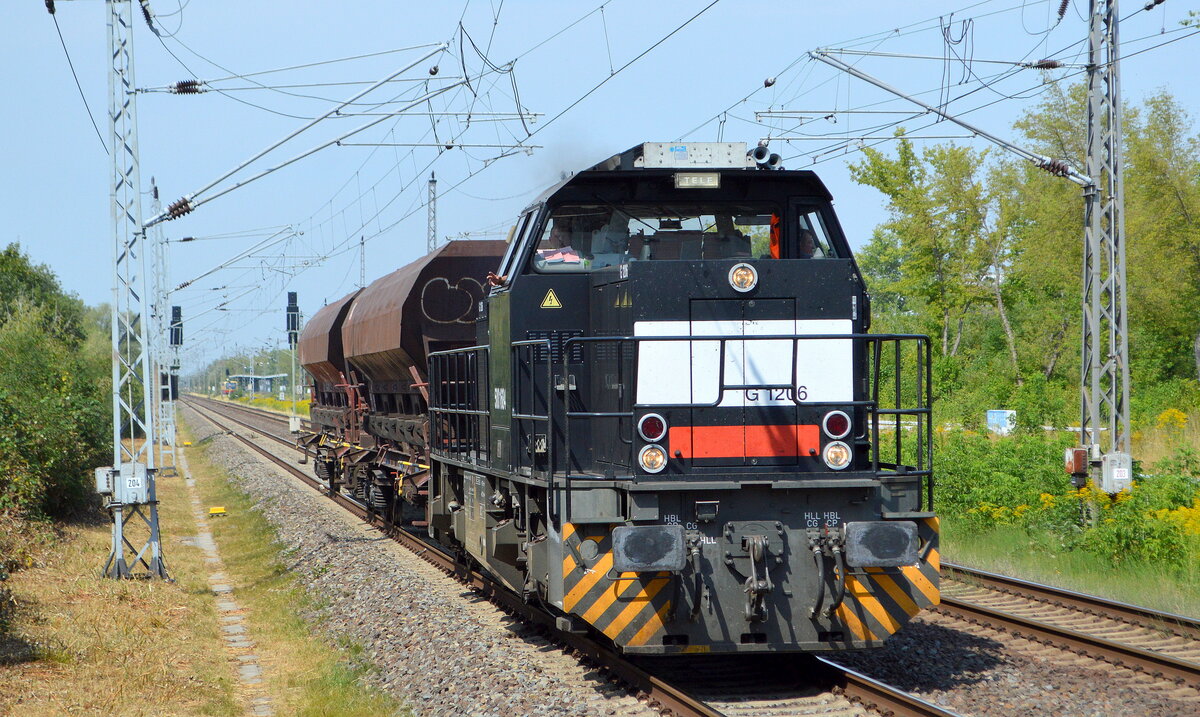 LOCON LOGISTIK & CONSULTING AG, Berlin [D] mit der northrail MaK G 1206  500 1684 
[NVR-Nummer: 92 80 1276 018-9 D-NRAIL] und zwei Schüttgutwagen Durchfahrt Bahnhof Berlin Hohenschönhausen am 18.08.22 Einen Gruß zurück an den TF. !!!