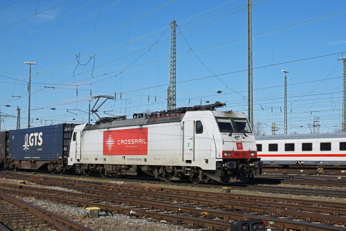 Lok 186 150-9 durchfährt den badischen Bahnhof. Die Aufnahme stammt vom 28.02.2020.
