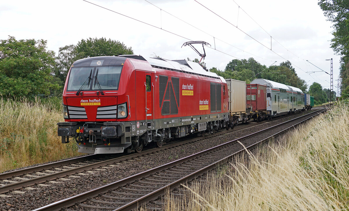 Lokomotive 248 999-5 am 05.07.2023 mit einem Überführungszug von Siemens in Kaarst.