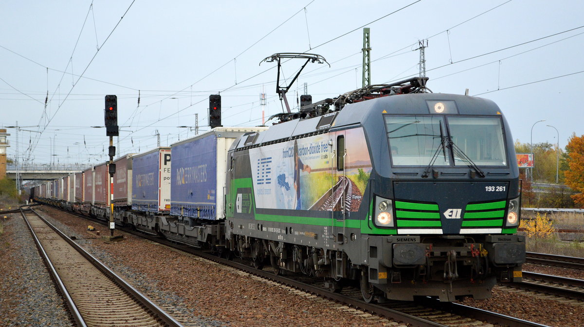 LTE Logistik und Transport GmbH, Graz [A] mit der ELL Vectron  193 261  [NVR-Nummer: 91 80 6193 261-5 D-ELOC] und Taschenwagenzug aus Poznan (Polen) Richtung Rotterdam am 12.11.19 Bf. Flughafen Berlin Schönefeld. 
