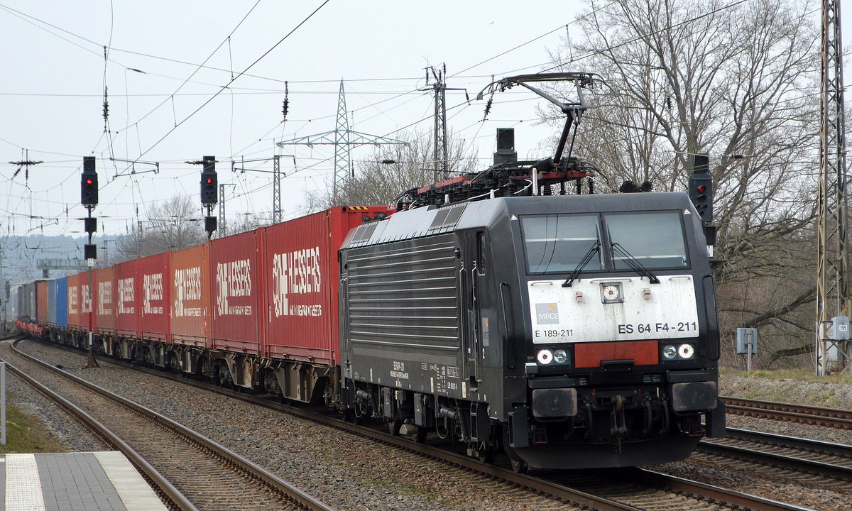 LTE mit der MRCE Dispo  ES 64 F4-211  [NVR-Nummer: 91 80 6189 211-6 D-DISPO] mit Container-/Taschenwagenzug Richtung Polen am 26.03.21 Durchfahrt Bf. Saarmund.