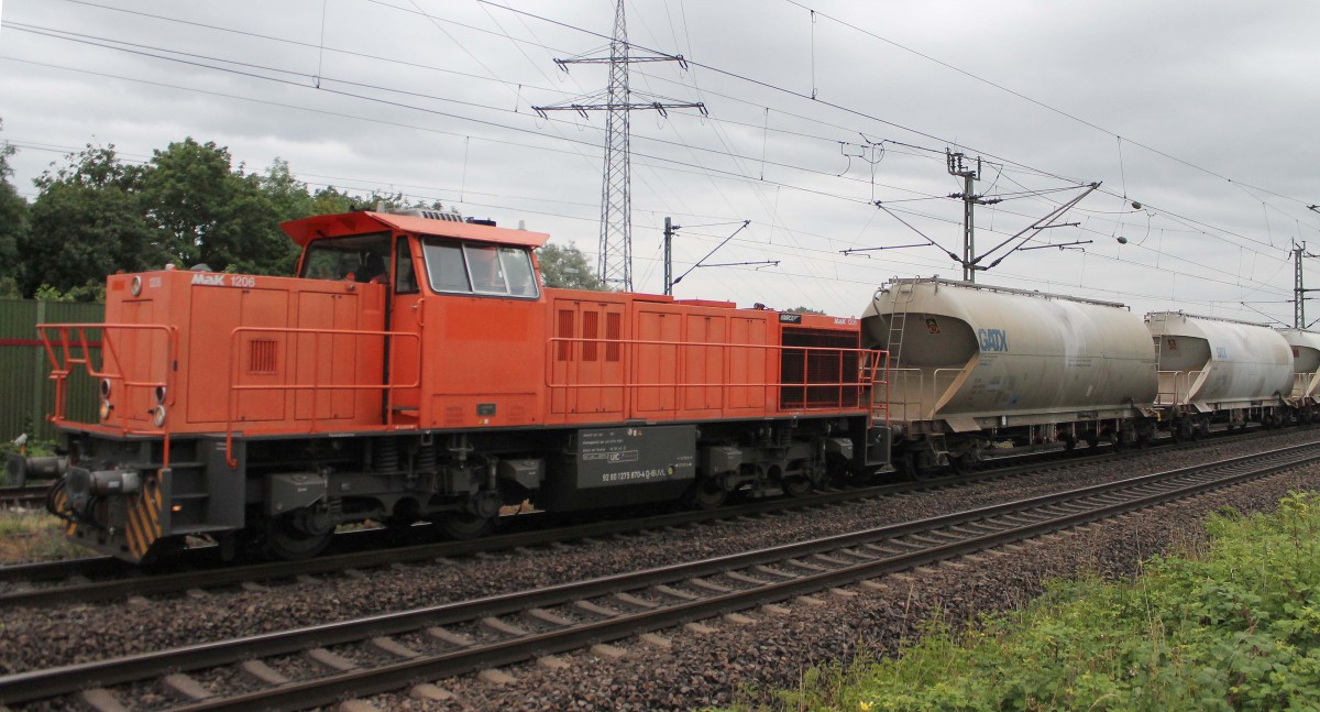MaK 1206 (275 870-4, MRCE) durchfuhr in den frühen Morgenstunden den Bahnhof Riedstadt-Goddelau, mit einem Kalkzug, Richtung Norden.