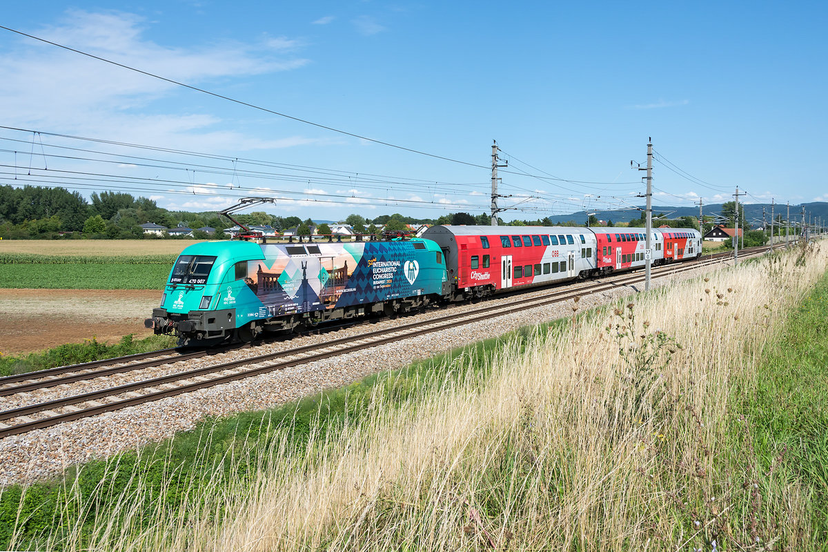 MAV-Start 470 007  52nd International Eucharistic Congress  war am 19.08.2019 mit dem REX 2123 unterwegs. Die Aufnahme entstand zwischen Langenlebarn und Muckendorf-Wipfing.