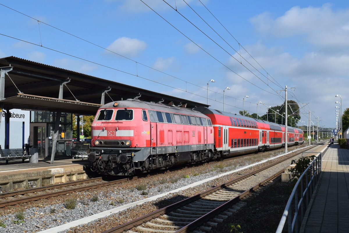 Meckenbeuren am 24.09.2021 mit 218 431 vor RE in Richtung Friedrichshafen