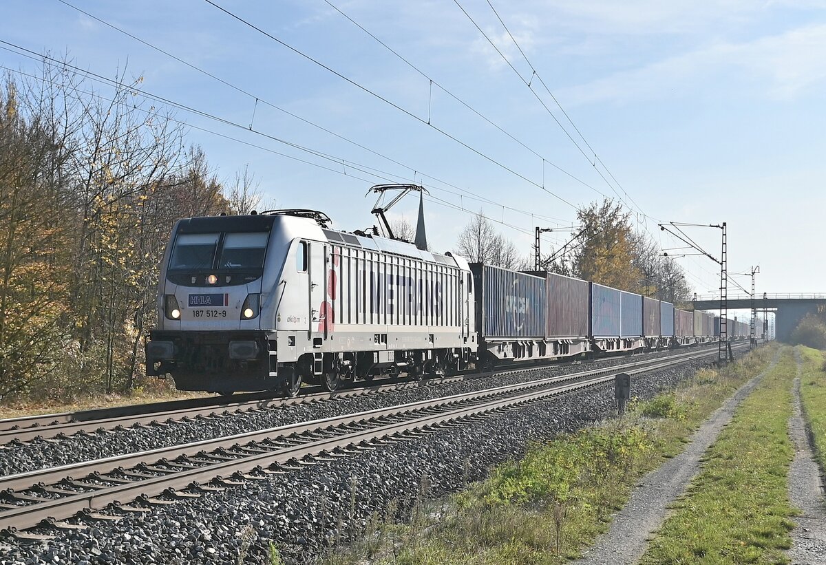 Metrans 187 512-9 mit einem KLV bei Thüngersheim gen Karlstadt. 9.11.2021