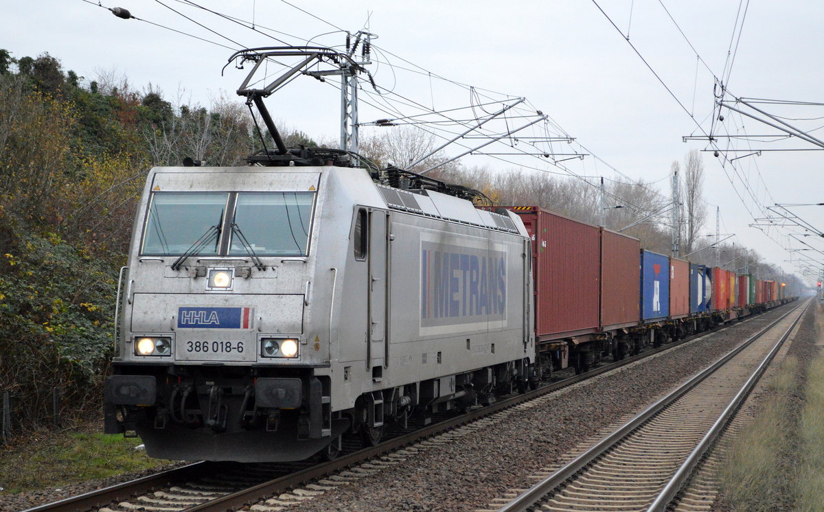 METRANS Rail s.r.o. mit  386 018-6  [NVR-Number: 91 54 7386 018-6 CZ-MT] und Containerzug Richtung Polen am 27.11.18 Bf. Berlin-Hohenschönhausen.