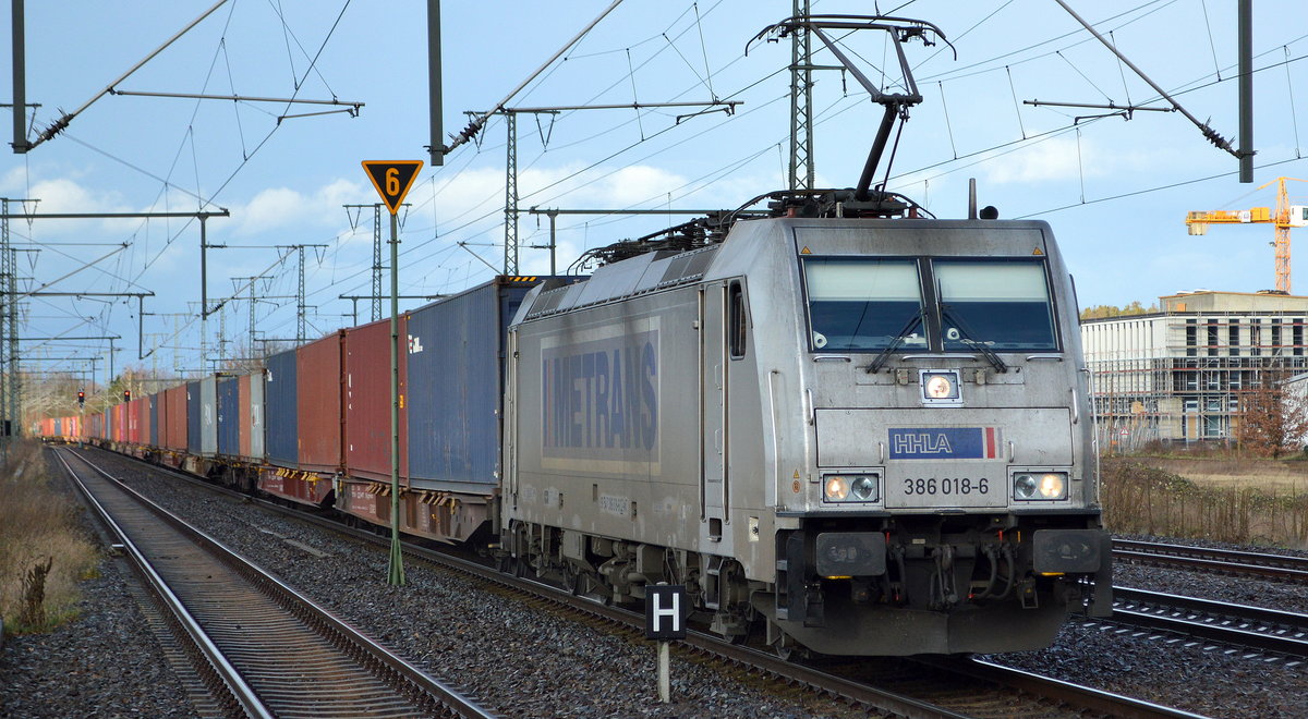 METRANS Rail s.r.o., Praha [CZ]  386 018-6  [NVR-Nummer: 91 54 7386 018-6 CZ-MT] mit Containerzug am 19.02.20 Durchfahrt Bhf. Golm (Potsdam).