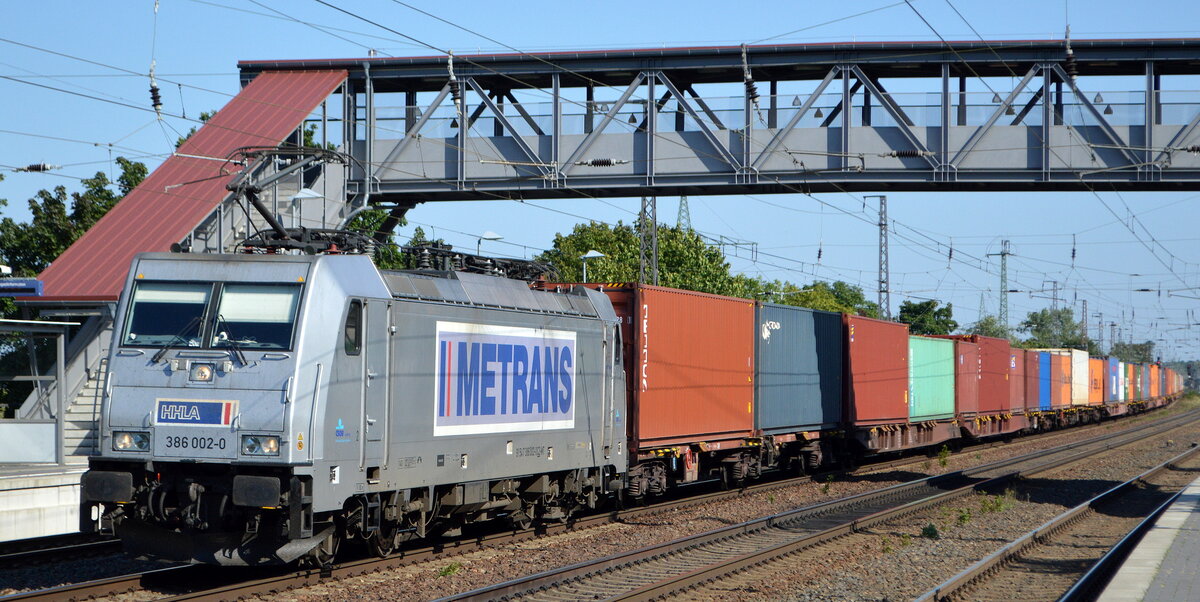 METRANS Rail s.r.o., Praha [CZ] mit  386 002-0  [NVR-Nummer: 91 54 7386 002-0 CZ-MT] und Containerzug am 09.09.21 Durchfahrt Bf. Saarmund.